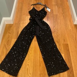 Gorgeous black spaghetti strap beaded all lined jumpsuit .. brand new